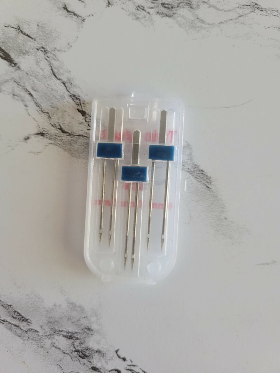 Sewing Machine Needle Sizes & Types Guide (FREE Chart!)