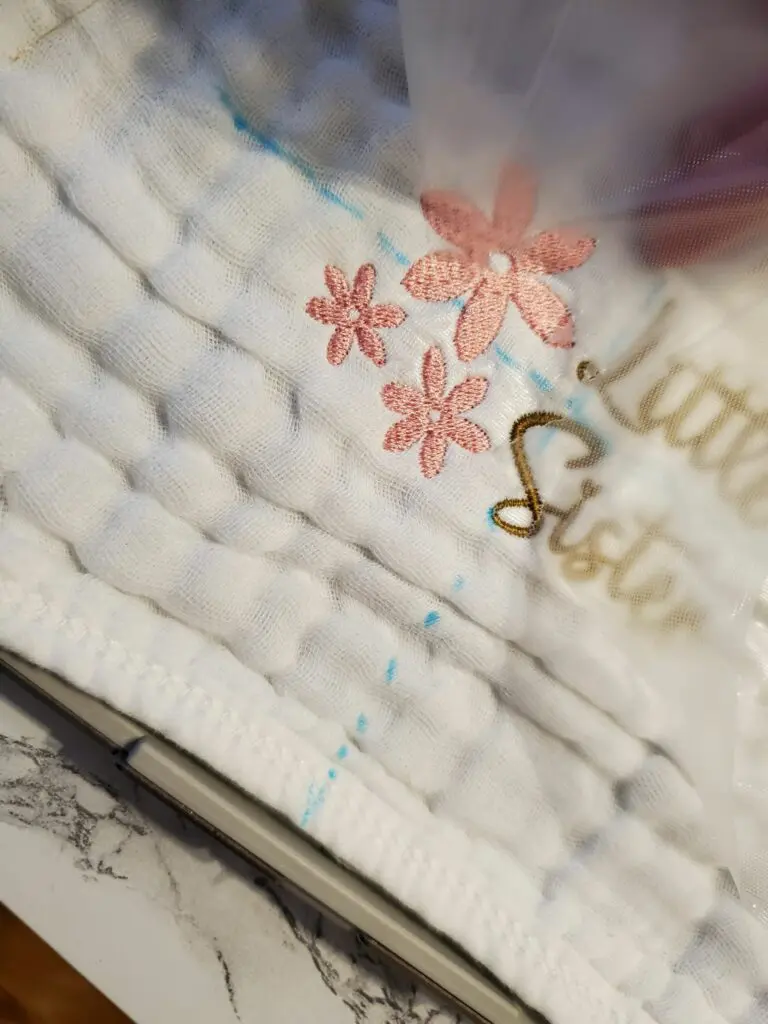 remove water soluble topping from embroidered burp cloth