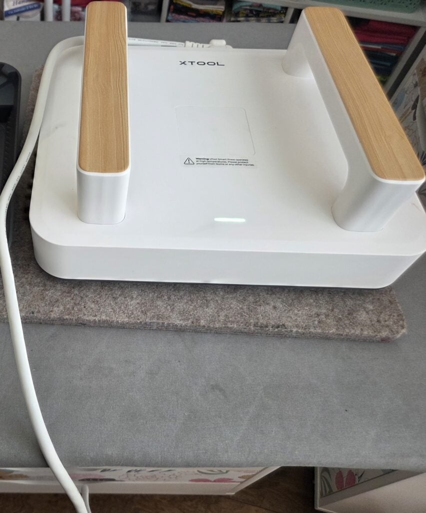 press the transfer onto the fabric tag