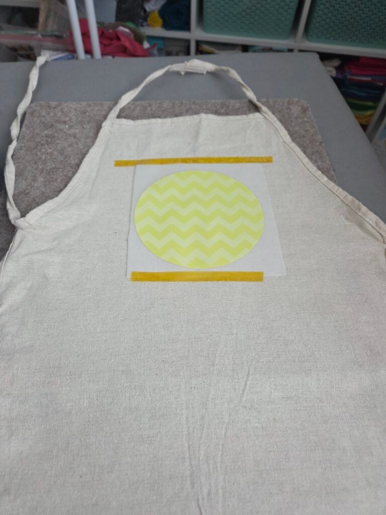 place the transfer on the embroidery blanks
