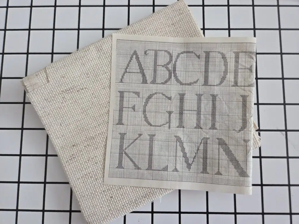cross stitch the quilt label